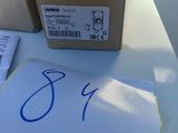a box with a piece of paper on top of a table