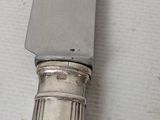 a knife that is sitting on top of a table