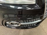 a close up of a car ' s front bumper and grille