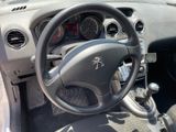 dashboard of a car with a steering wheel and dashboard controls