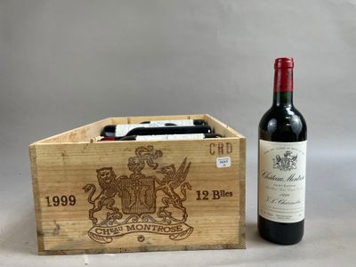 a wooden box with a bottle of wine and a bottle of wine in it