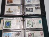 a lot of stamps in a folder on the table
