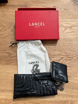 1 portefeuille ou compagnon LANCEL PARIS en cuir noir et sa …