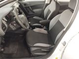 the interior of a small white car with black seats and a steering wheel