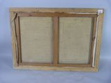 an old picture frame with a picture of a window in it