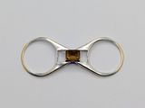 a close up of a pair of scissors with a metal handle