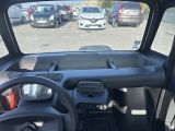 a view of the inside of a vehicle from the driver ' s seat