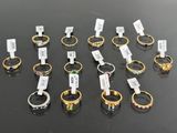 a lot of different rings that are on a table