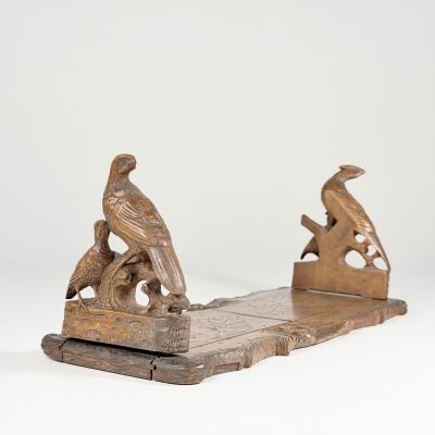 paire de serre-livres anciens en fonte représentant des oiseaux sur une branche