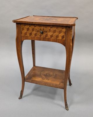 an old wooden table with a drawer on top of it