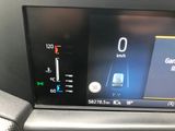 a picture of a car dashboard with a digital display on it