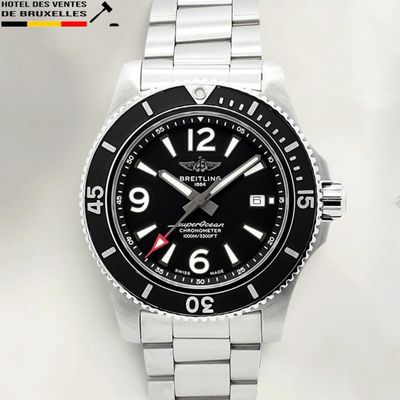 an image of a close up of a wrist watch on a white surface