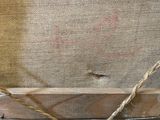 a close up of a piece of wood with a rope