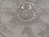 a glass plate with a circular design on it