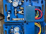 a blue box with a bunch of tools in it