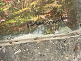 a picture of a painting on the ground with graffiti on it