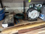 a pile of wood and other items on a pallet