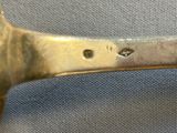 a close up of a pair of scissors on a table