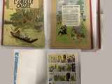 trois livres pour enfants avec des illustrations représentant des personnes dans un bateau