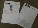 two papers that are sitting on the floor