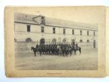 a old photo of a group of men on horses