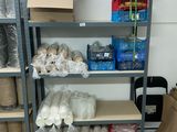 a shelf with many items on it in a room