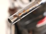 a close up of a metal pipe that has rust on it