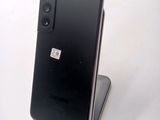 a close up of a cell phone on a stand
