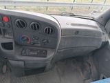 a dashboard of a truck with a steering control panel