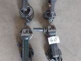 trois types d'outils différents posés par terre