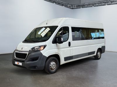a picture of a white van parked in a garage