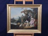 tableau sur chevalet représentant une famille dans un paysage