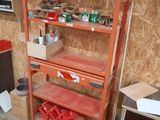 a shelf that has a lot of items on it