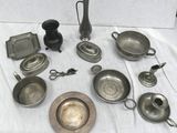 a lot of silver items that are on a table