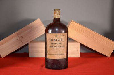 a bottle of wine that is sitting on a table