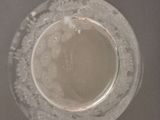a glass of water that is sitting on a table