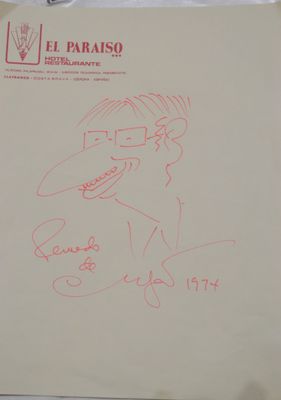 someone is writing on a piece of paper with a drawing of a man
