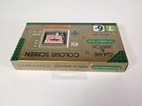 an image of a nintendo game console sitting on top of a white table