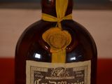 a bottle of liquor that is sitting on a table