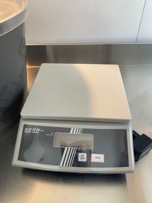 an image of a kitchen scale and a pot on a counter