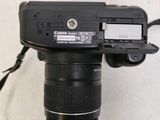 a close up of a camera with a lens attached to it