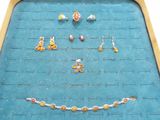 a picture of a necklace and earring set in a box