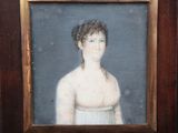 painting of a woman in a white dress in a wooden frame