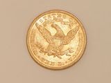 an image of a gold coin with a eagle on it