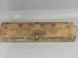an old wooden tool box sitting on top of a white surface