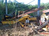 a large machine that is sitting in the grass