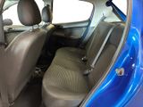 a blue car that is sitting in the back of the car