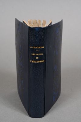 a black book with gold lettering on it
