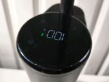 a digital clock on the side of a blender