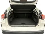 the back of a white car with its trunk open on a white background